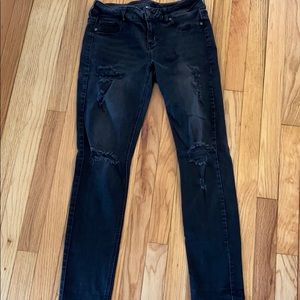 Black distressed jeggings.